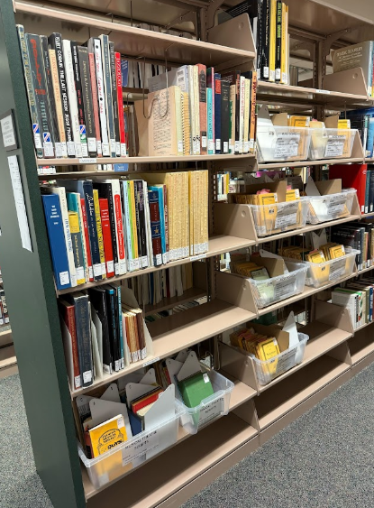 This is an image of the library shelves with music scores